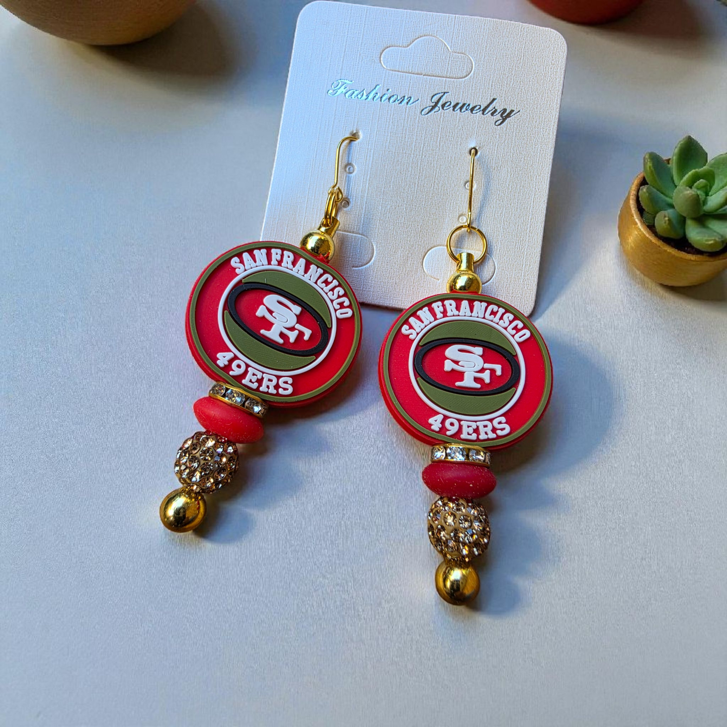 football earrings, game day jewelry, red and gold earrings, sports fan accessories, team spirit earrings, game day fashion, football season
