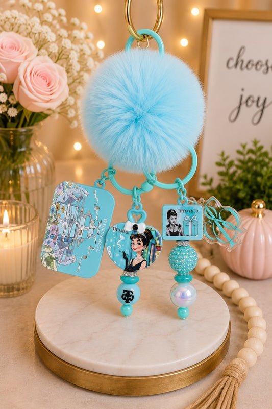 Luxury Tiffany-Inspired Blue Pom Pom Keychain with Audrey Charm & Floral Charm